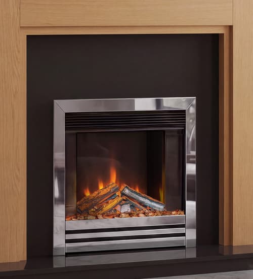 Wooden fireplace mantel with a chrome electric fire - small image
