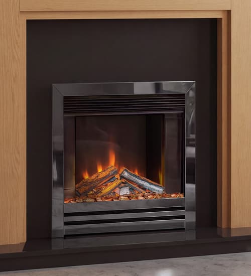 Wooden fireplace mantel with a Black electric fire in a contemporary UK living room - Small image