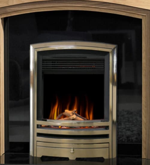 White fireplace mantel with a gold fascia electric fire in a UK home living room small image.