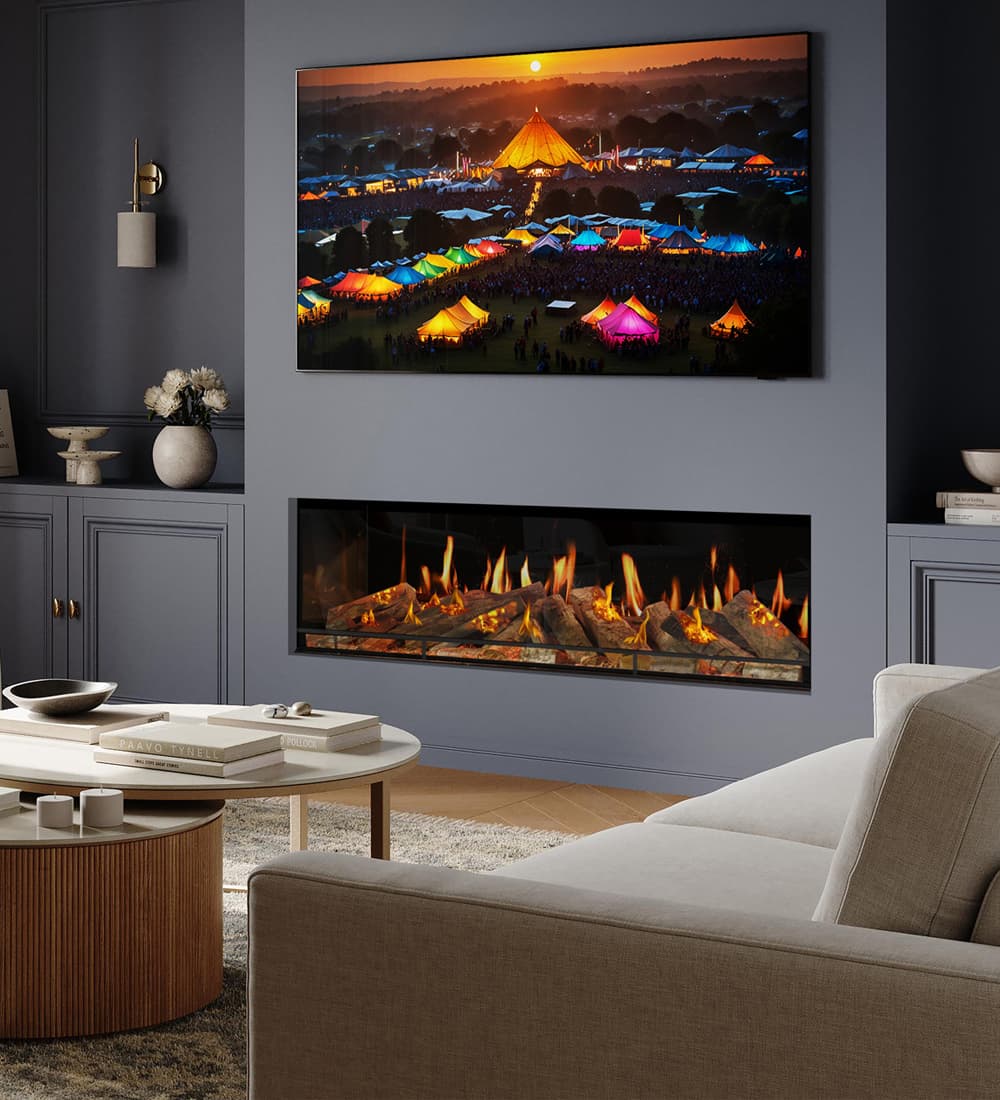 Evonic Genesis 1500 Built-in Electric Fire installed with a TV above on a grey wall with shelving either side