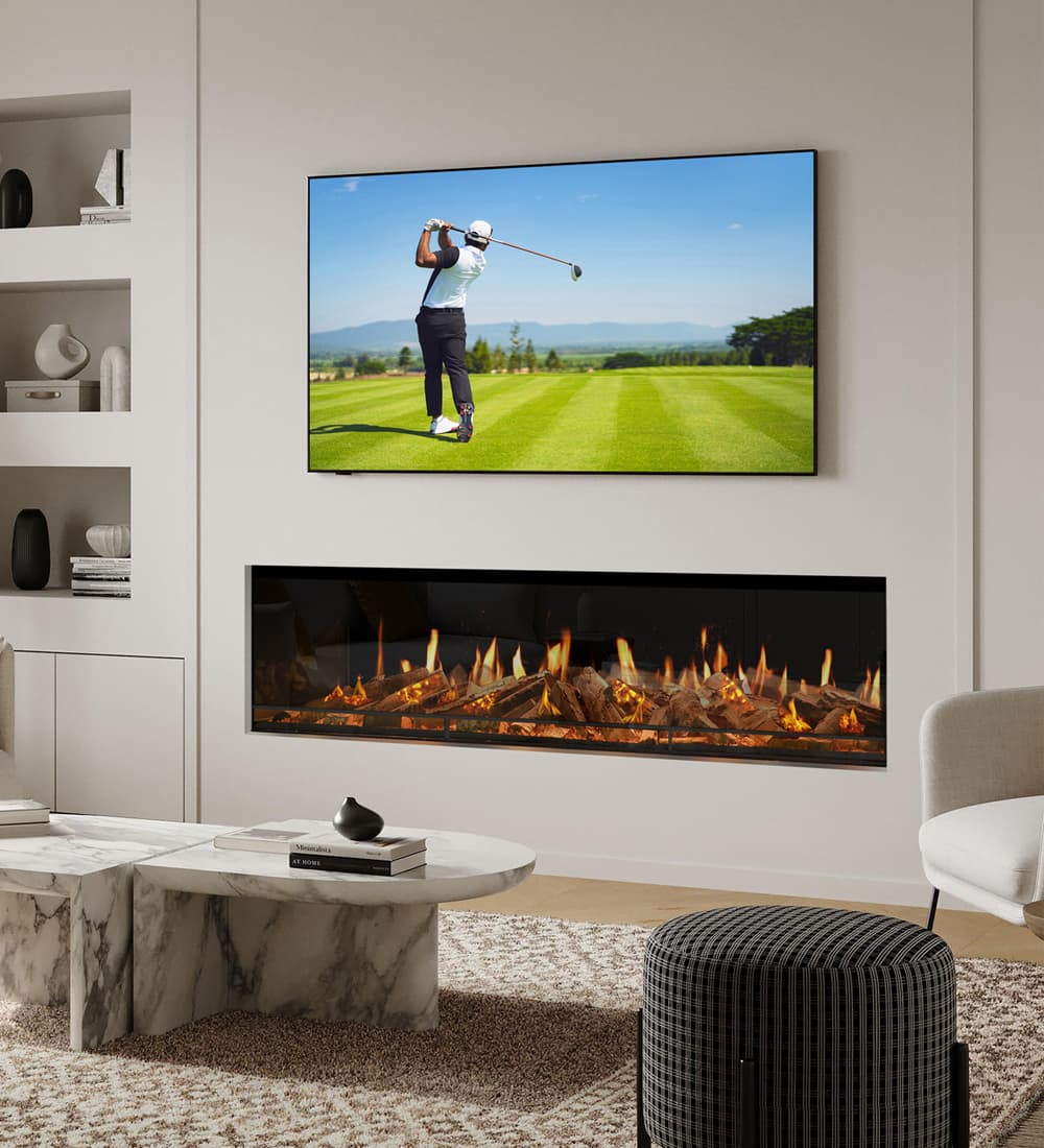 Genesis 1860 Built-in Electric fire installed into a beige wall with shelving and wall mounted TV