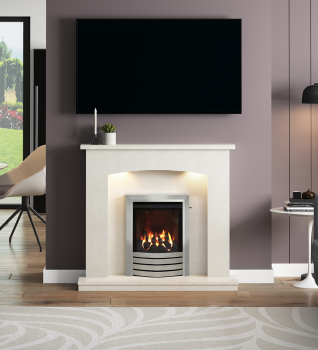 Flare Isabelle Micro Marble Fireplace shown in a modern living room with the Brushed Steel Design fascia gas fire