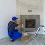 Fireplace installer at work